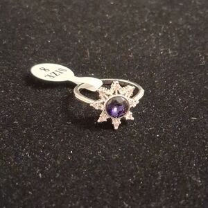 Fragrant Jewels Silver Starburst Ring with Purple Stone